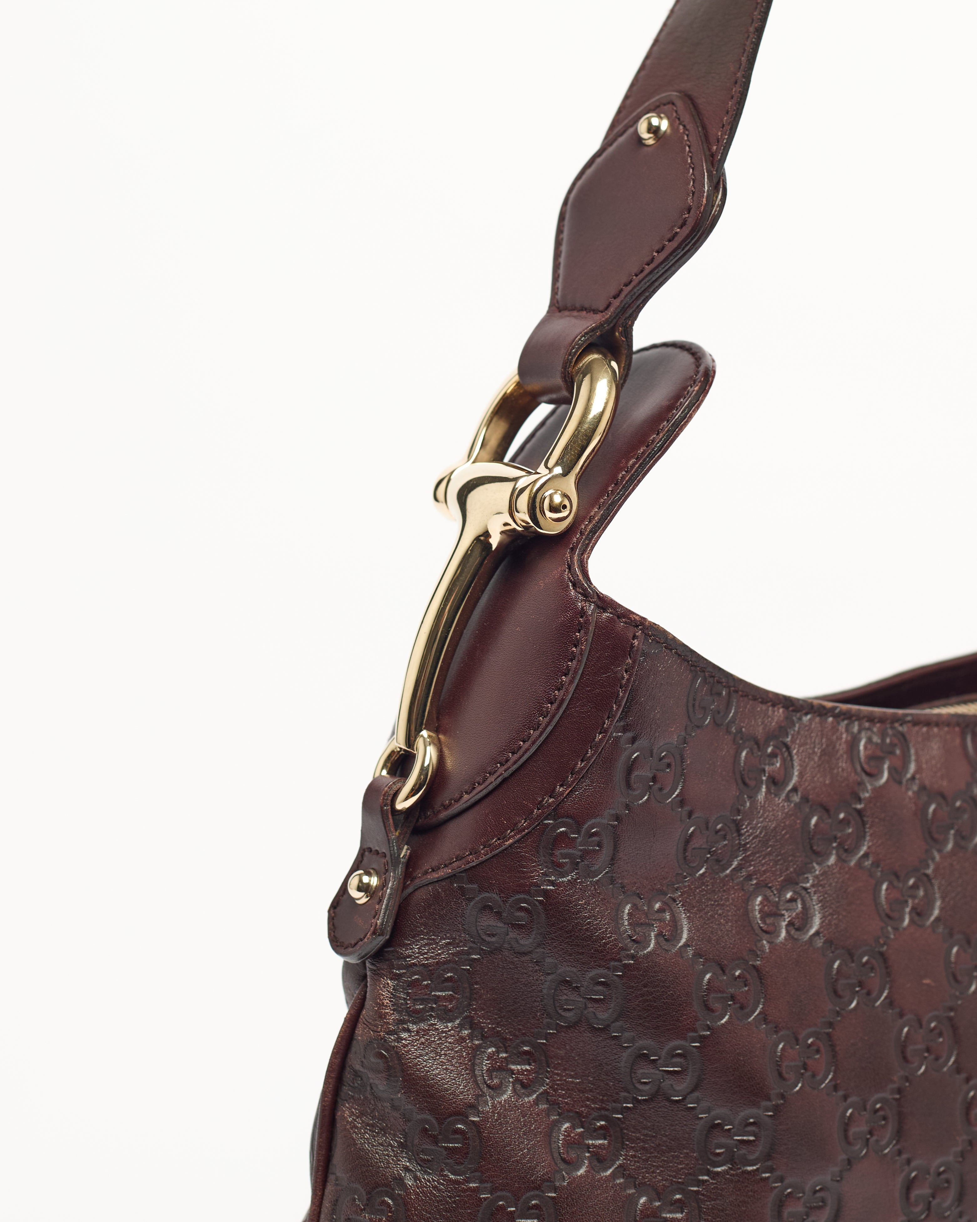 GUCCI DEBOSSED LEATHER HORSEBIT HOBO BAG