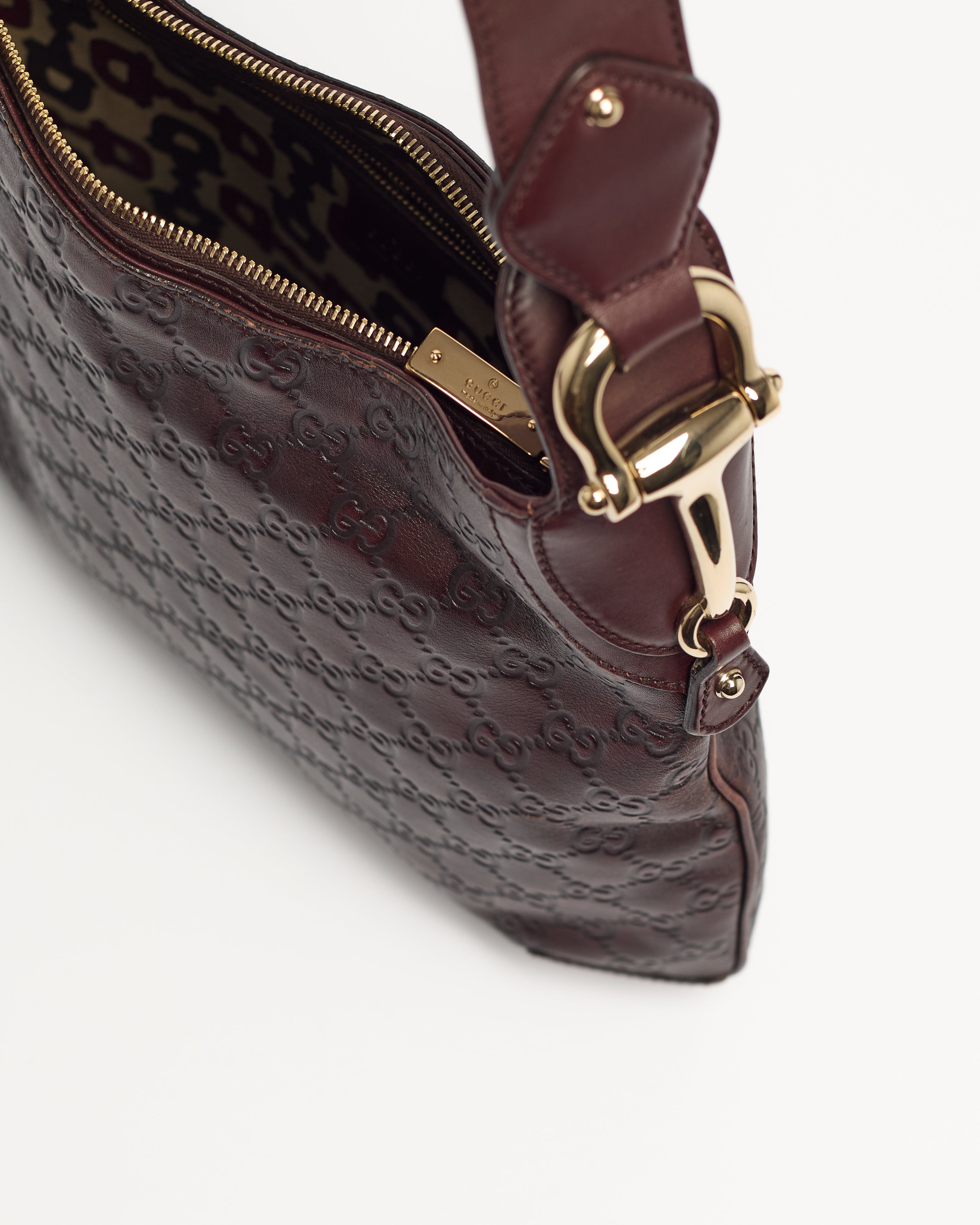 GUCCI DEBOSSED LEATHER HORSEBIT HOBO BAG